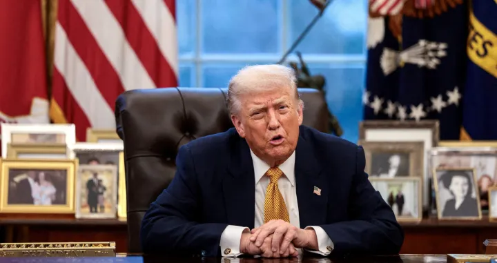 FILE PHOTO: U.S. President Donald Trump is interviewed by Reuters White House correspondent Steve Holland (not pictured) during an exclusive interview in the Oval Office in the White House in Washington, D.C., U.S., January 14, 2026. REUTERS/Evelyn Hockstein/File Photo/Evelyn Hockstein