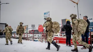 Danish soldiers walk after disembarking at the harbor in Nuuk, Greenland, January 18, 2026. Mads Claus Rasmussen/Ritzau Scanpix/via REUTERS ATTENTION EDITORS - THIS IMAGE WAS PROVIDED BY A THIRD PARTY. DENMARK OUT. NO COMMERCIAL OR EDITORIAL SALES IN DENMARK./Mads Claus Rasmussen