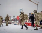 Danish soldiers walk after disembarking at the harbor in Nuuk, Greenland, January 18, 2026. Mads Claus Rasmussen/Ritzau Scanpix/via REUTERS ATTENTION EDITORS - THIS IMAGE WAS PROVIDED BY A THIRD PARTY. DENMARK OUT. NO COMMERCIAL OR EDITORIAL SALES IN DENMARK./Mads Claus Rasmussen