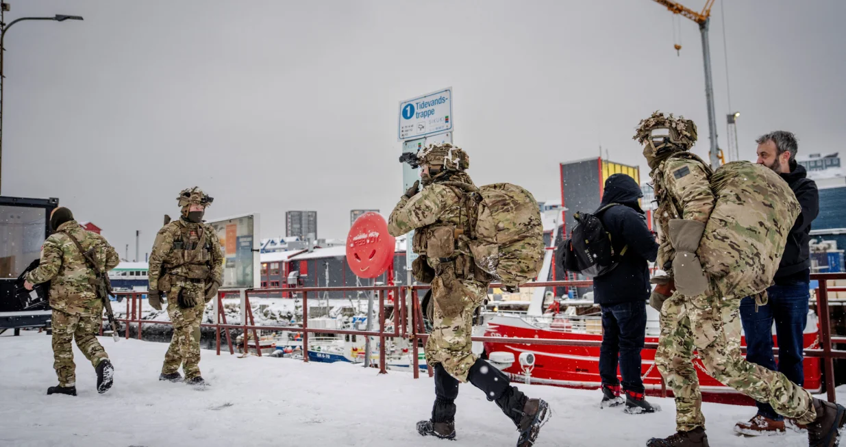 Danish soldiers walk after disembarking at the harbor in Nuuk, Greenland, January 18, 2026. Mads Claus Rasmussen/Ritzau Scanpix/via REUTERS ATTENTION EDITORS - THIS IMAGE WAS PROVIDED BY A THIRD PARTY. DENMARK OUT. NO COMMERCIAL OR EDITORIAL SALES IN DENMARK./Mads Claus Rasmussen