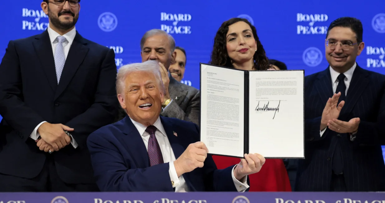 U.S. President Donald Trump takes part in a charter announcement for his Board of Peace initiative aimed at resolving global conflicts, alongside the 56th annual World Economic Forum (WEF), in Davos, Switzerland, January 22, 2026. REUTERS/Jonathan Ernst/Jonathan Ernst