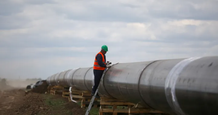 FILE PHOTO: A worker is seen next to a pipe at a construction site on the extension of Russia's TurkStream gas pipeline after a visit of Serbia's President Aleksandar Vucic and Bulgaria's Prime Minister Boyko Borissov, in Letnitsa, Bulgaria, June 1, 2020. REUTERS/ Stoyan Nenov//File Photo/Stoyan Nenov