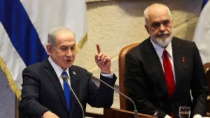 Israeli Prime Minister Benjamin Netanyahu speaks at the plenum of the Knesset, next to Albania's Prime Minister Edi Rama, in Jerusalem, January 26, 2026. REUTERS/Ronen Zvulun/Ronen Zvulun
