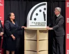 Jon Wolfsthal, director of global risk at the Federation of American Scientists (FAS), Asha George, executive director of the Bipartisan Commission on Biodefense, and Steve Fetter, professor of public policy and former dean at the University of Maryland, reveal the location of the minute hand on its Doomsday Clock, indicating what world developments mean for the perceived likelihood of nuclear catastrophe, during a town-hall in Washington, D.C., U.S., January 23, 2026. REUTERS/Kevin Fogarty/Kevin Fogarty