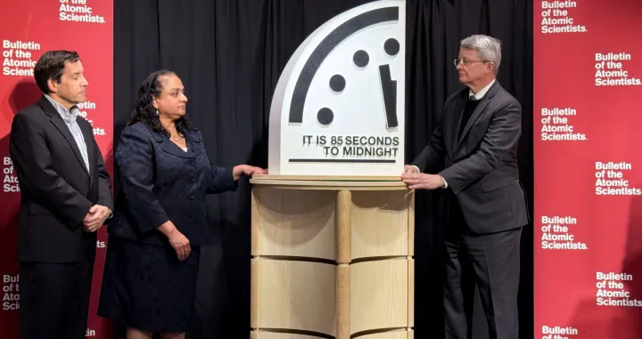Jon Wolfsthal, director of global risk at the Federation of American Scientists (FAS), Asha George, executive director of the Bipartisan Commission on Biodefense, and Steve Fetter, professor of public policy and former dean at the University of Maryland, reveal the location of the minute hand on its Doomsday Clock, indicating what world developments mean for the perceived likelihood of nuclear catastrophe, during a town-hall in Washington, D.C., U.S., January 23, 2026. REUTERS/Kevin Fogarty/Kevin Fogarty