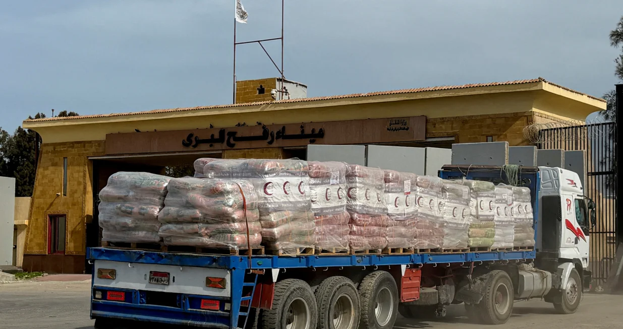 A truck carrying humanitarian aid at the Rafah border on the Egyptian side, in Rafah, Egypt, January 29, 2026. The Rafah border crossing is expected to open after Israel recovered the remains of the last remaining hostage held in Gaza. Picture taken with a mobile phone. REUTERS/Stringer/Stringer