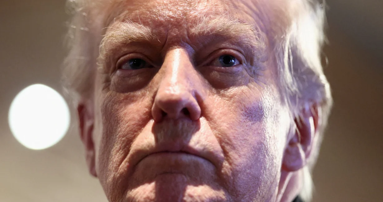 U.S. President Donald Trump looks on as he visits Machine Shed restaurant in Urbandale, Iowa, U.S., January 27, 2026. REUTERS/Kevin Lamarque  TPX IMAGES OF THE DAY/Kevin Lamarque