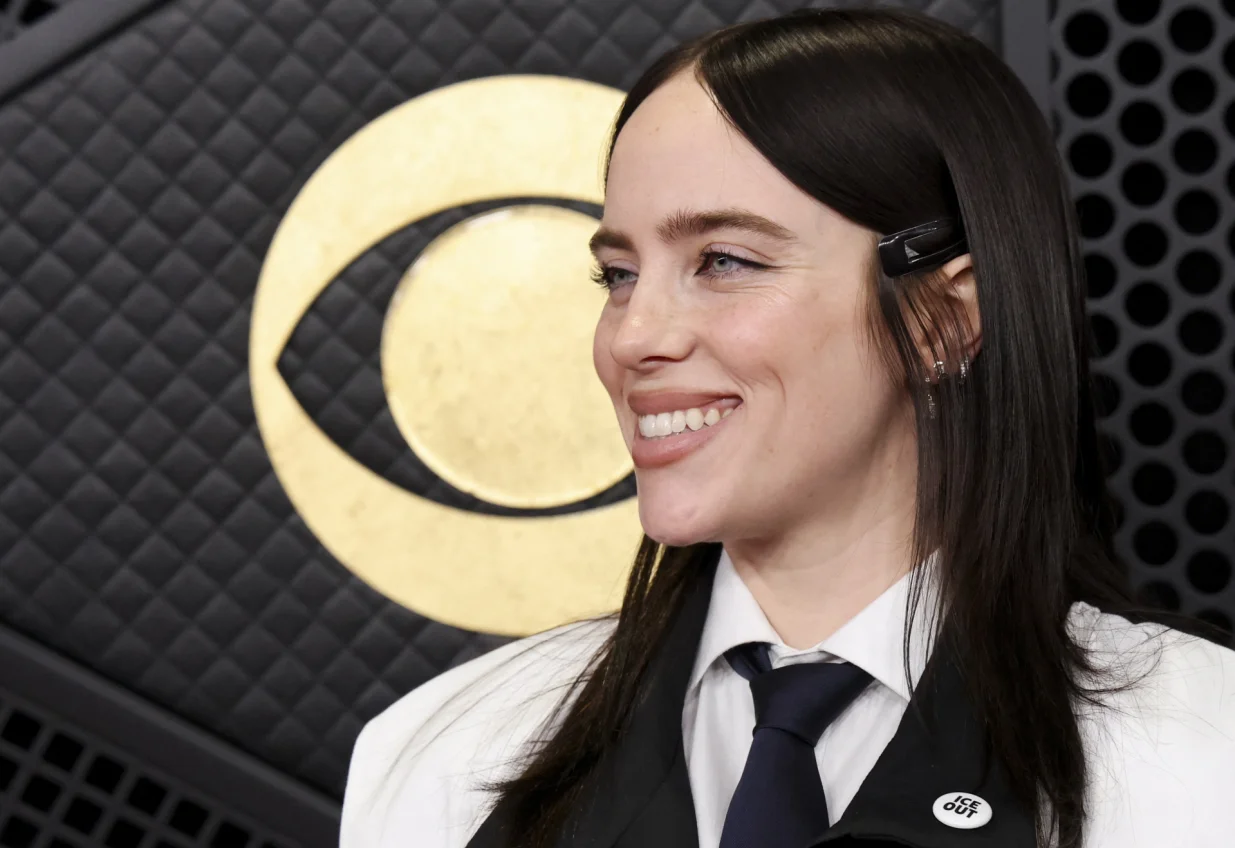 Billie Eilish wears an ICE Out pin as she poses at the red carpet during the 68th Annual Grammy Awards in Los Angeles, California, U.S., February 1, 2026. REUTERS/Mario Anzuoni/Mario Anzuoni
