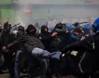 Police officers clash with demonstrators, as they were trying to block a road leading to the Santa Giulia Arena, on the day of a protest against the environmental, economic and social impact of the Milano-Cortina 2026 Winter Olympics, in Milan, Italy, February 7, 2026. REUTERS/Claudia GrecoвЂЁ/Claudia Greco