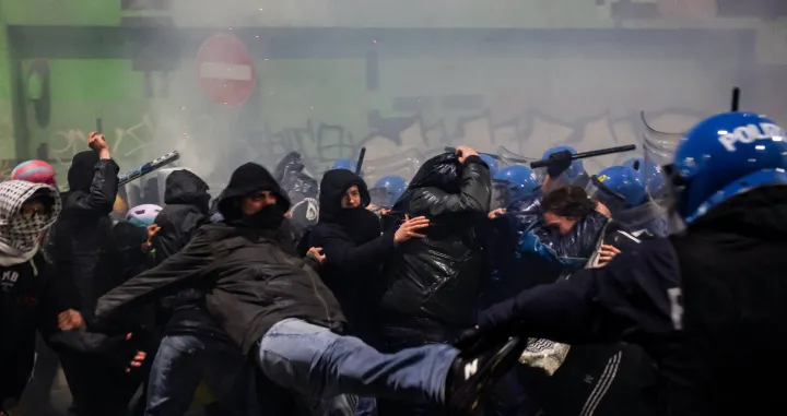 Police officers clash with demonstrators, as they were trying to block a road leading to the Santa Giulia Arena, on the day of a protest against the environmental, economic and social impact of the Milano-Cortina 2026 Winter Olympics, in Milan, Italy, February 7, 2026. REUTERS/Claudia GrecoвЂЁ/Claudia Greco