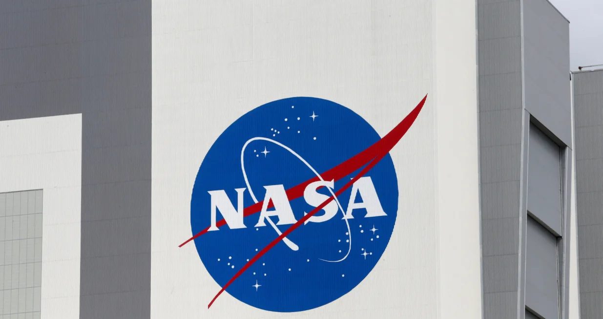 FILE PHOTO: The NASA logo is seen at Kennedy Space Center ahead of the NASA/SpaceX launch of a commercial crew mission to the International Space Station in Cape Canaveral, Florida, U.S., April 16, 2021. REUTERS/Joe Skipper/File Photo/Joe Skipper