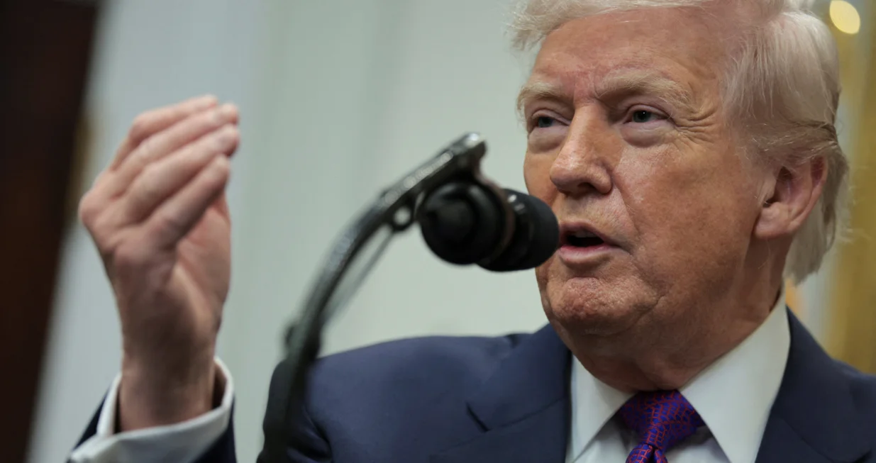 U.S. President Donald Trump makes an announcement on the repeal of a scientific finding that greenhouse gas emissions endanger human health, removing the legal basis for federal climate regulations, at the White House in Washington, D.C., U.S., February 12, 2026. REUTERS/Jonathan Ernst/Jonathan Ernst