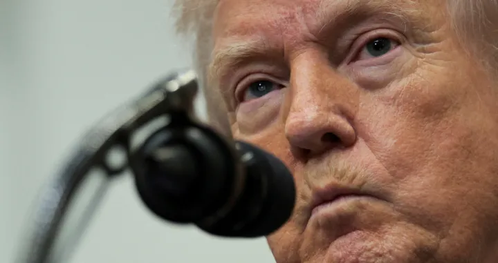FILE PHOTO: U.S. President Donald Trump makes an announcement at the White House in Washington, D.C., U.S., February 12, 2026. REUTERS/Jonathan Ernst/File Photo/Jonathan Ernst