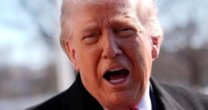 U.S. President Donald Trump speaks as he departs from the South Lawn at the White House in Washington, D.C., U.S., February 13, 2026. REUTERS/Kent Nishimura/Kent Nishimura