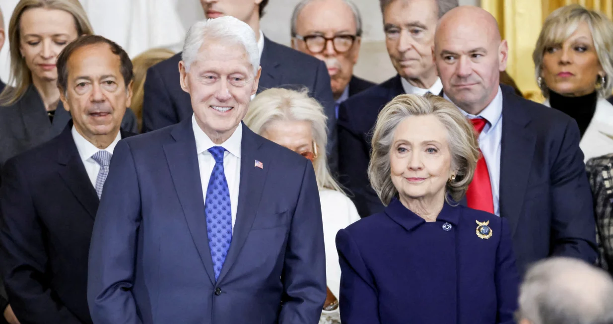 FILE PHOTO: Former U.S. President Bill Clinton and former U.S. Secretary of State Hillary Clinton arrive for Donald Trump's inauguration as the next President of the United States in the Rotunda of the United States Capitol in Washington, U.S., January 20, 2025. SHAWN THEW/POOL/Pool via REUTERS/File Photo/Shawn Thew/pool