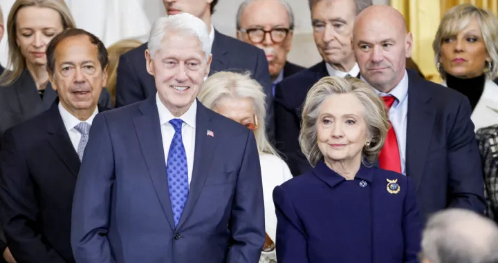 FILE PHOTO: Former U.S. President Bill Clinton and former U.S. Secretary of State Hillary Clinton arrive for Donald Trump's inauguration as the next President of the United States in the Rotunda of the United States Capitol in Washington, U.S., January 20, 2025. SHAWN THEW/POOL/Pool via REUTERS/File Photo/Shawn Thew/pool
