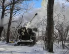 Service members of the 48th Separate Artillery Brigade of the Ukrainian Armed Forces fire a 2S22 Bohdana self-propelled howitzer towards Russian troops near a front line, amid Russia's attack on Ukraine, in Kharkiv region, Ukraine February 9, 2026. REUTERS/Vyacheslav Madiyevskyy/Vyacheslav Madiyevskyy