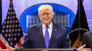 U.S. President Donald Trump gestures as he speaks during a press briefing at the White House, following the Supreme Court's ruling that Trump had exceeded his authority when he imposed tariffs, in Washington, D.C., U.S., February 20, 2026. REUTERS/Kevin Lamarque REFILE - CORRECTING MONTH/Kevin Lamarque