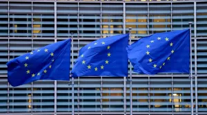 FILE PHOTO: European Union flags flutter outside the EU Commission headquarters, on the day of a European Union leaders' summit in Brussels, Belgium, December 18, 2025. REUTERS/Stephanie Lecocq/File Photo/Stephanie Lecocq