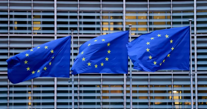 FILE PHOTO: European Union flags flutter outside the EU Commission headquarters, on the day of a European Union leaders' summit in Brussels, Belgium, December 18, 2025. REUTERS/Stephanie Lecocq/File Photo/Stephanie Lecocq