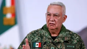Mexico's Defense Minister Ricardo Trevilla Trejo speaks during a press conference about the wave of violence in Mexico, following the killing of Mexican drug lord Nemesio Oseguera, known as 'El Mencho', in a military operation on Sunday, at Palacio Nacional, in Mexico City, Mexico, February 23, 2026. REUTERS/Raquel Cunha/Raquel Cunha