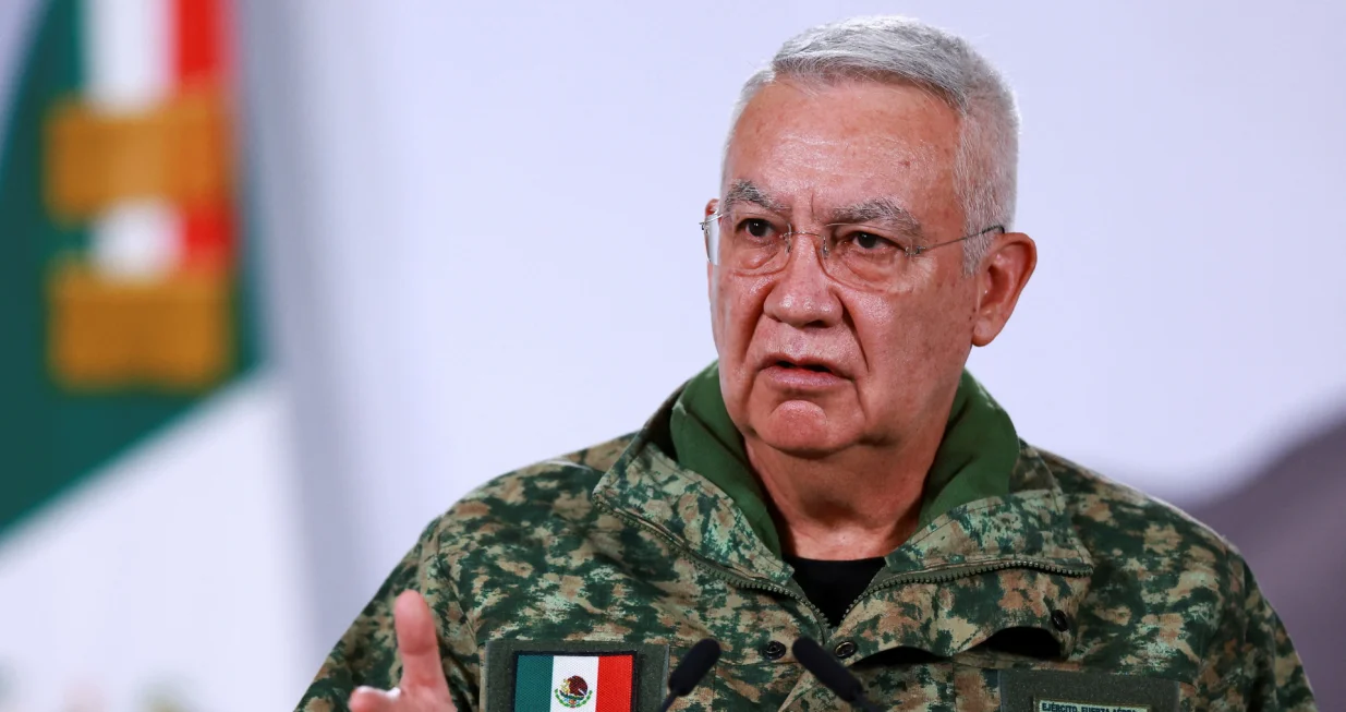 Mexico's Defense Minister Ricardo Trevilla Trejo speaks during a press conference about the wave of violence in Mexico, following the killing of Mexican drug lord Nemesio Oseguera, known as 'El Mencho', in a military operation on Sunday, at Palacio Nacional, in Mexico City, Mexico, February 23, 2026. REUTERS/Raquel Cunha/Raquel Cunha