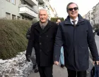 Members of the National Authority for Investigation and Prosecution of Economic and Environmental Crime search Thorbjorn Jagland's apartment building as he walks with his lawyer Anders Brosveet, in Frogner, Oslo, Norway, February 12, 2026. NTB/Stian Lysberg Solum via REUTERS ATTENTION EDITORS - THIS IMAGE WAS PROVIDED BY A THIRD PARTY. NORWAY OUT. NO COMMERCIAL OR EDITORIAL SALES IN NORWAY./Stian Lysberg Solum