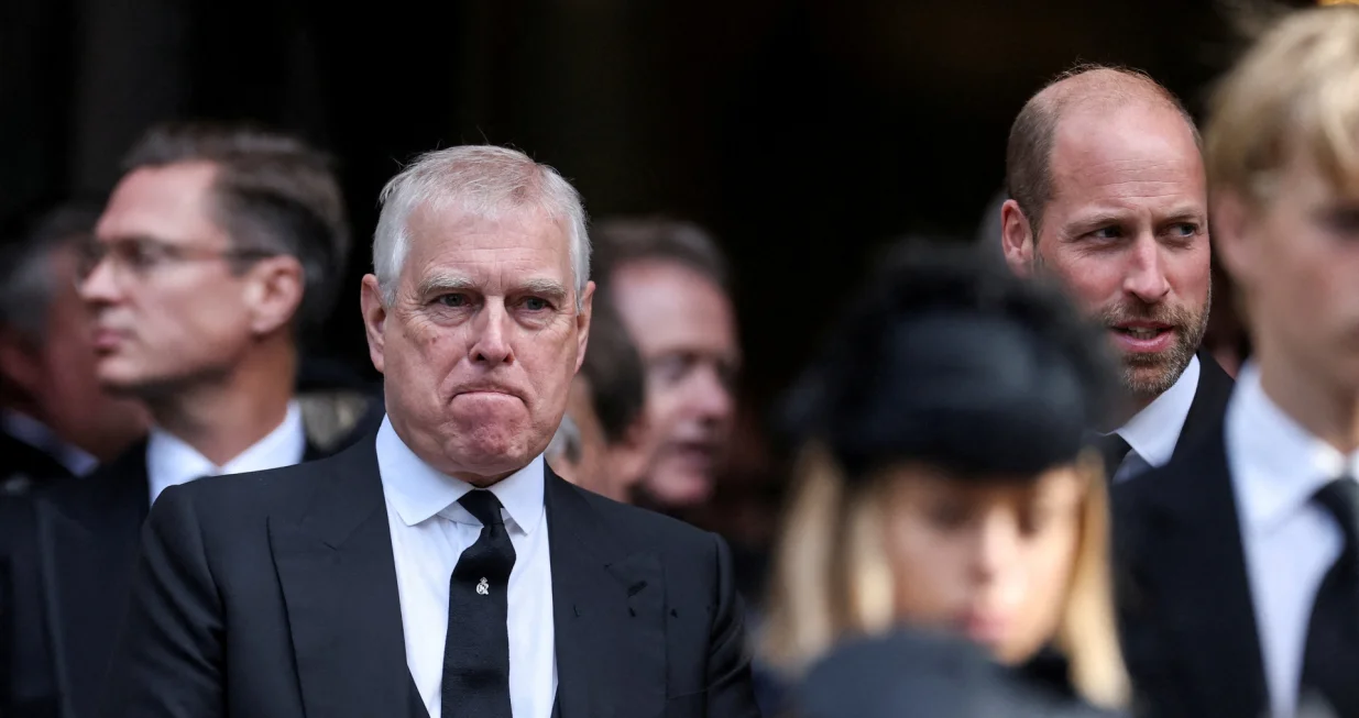 FILE PHOTO: Britain's Prince Andrew stands next to Prince William at the end of the Requiem Mass, on the day of the funeral of Britain's Katharine, Duchess of Kent, at Westminster Cathedral in London, Britain, September 16, 2025. REUTERS/Toby Melville/File Photo/Toby Melville