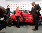 epa08198105 German Chancellor Angela Merkel (C-L) and South African President Cyril Ramaphosa (C-R) during a handover ceremony of a BMW i3 at BMW Rosslyn Plant South Africa in Pretoria, Republic of South Africa, 06 February 2020. Merkel is on a three-day trip to South Africa and Angola. EPA/CLEMENS BILAN/Clemens Bilan