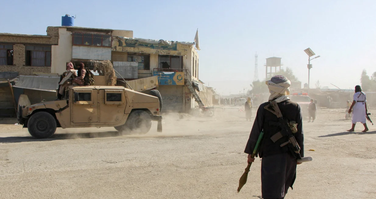 FILE PHOTO: Afghan Taliban fighters patrol near the Afghanistan-Pakistan border in Spin Boldak, Kandahar Province, following exchanges of fire between Pakistani and Afghan forces in Afghanistan, October 15, 2025. REUTERS/Stringer/File Photo/Stringer