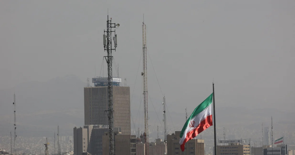 An Iranian flag flutters, as Israel and the U.S. launched strikes on Iran, in Tehran, Iran, February 28, 2026. Majid Asgaripour/WANA (West Asia News Agency) via REUTERS ATTENTION EDITORS - THIS PICTURE WAS PROVIDED BY A THIRD PARTY/Majid Asgaripour