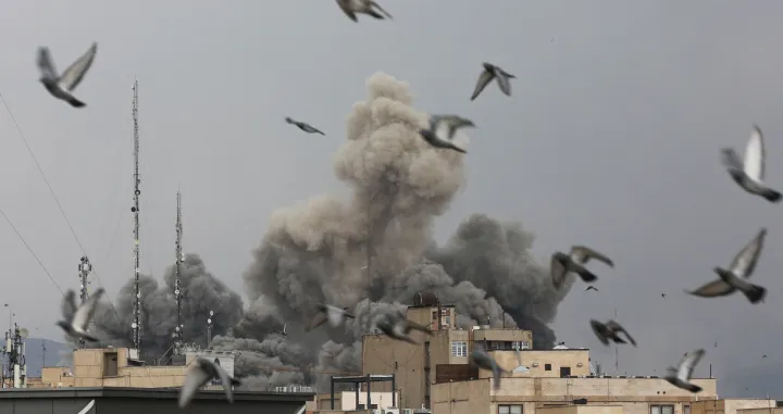 Birds fly as smoke rises following an explosion, after Israel and the U.S. launched strikes on Iran, amid the U.S.-Israel conflict with Iran, in Tehran, Iran, March 2, 2026. Majid Asgaripour/WANA (West Asia News Agency) via REUTERS ATTENTION EDITORS - THIS PICTURE WAS PROVIDED BY A THIRD PARTY/Majid Asgaripour
