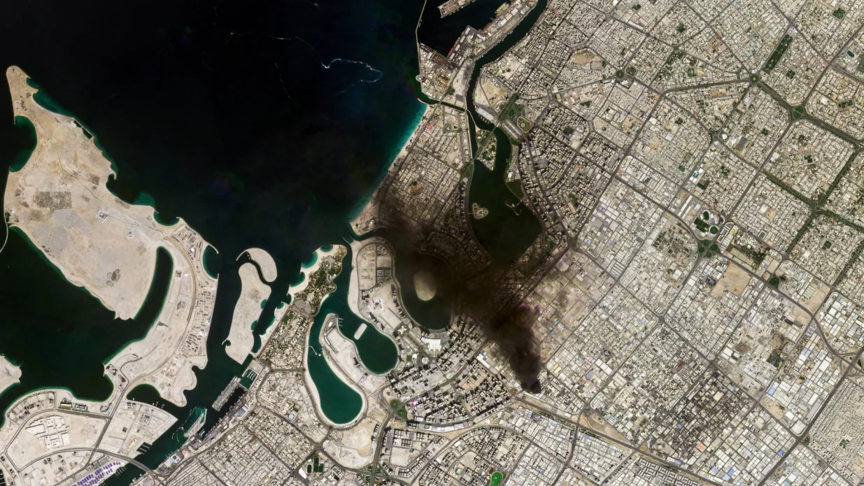 A satellite image of an industrial area covered in smoke in Dubai, United Arab Emirates, March 1, 2026. 2026 Planet Labs PBC/Handout via REUTERS THIS IMAGE HAS BEEN SUPPLIED BY A THIRD PARTY. MANDATORY CREDIT/2026 Planet Labs Pbc