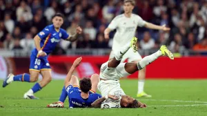 Soccer Football - LaLiga - Real Madrid v Getafe - Santiago Bernabeu, Madrid, Spain - March 2, 2026 Getafe's Mario Martin in action with Real Madrid's Rodrygo REUTERS/Violeta Santos Moura/Foto: Violeta Santos Moura