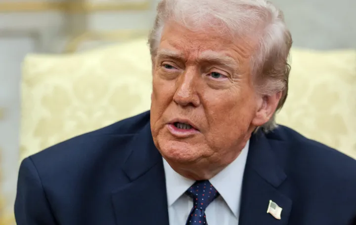 U.S. President Donald Trump speaks as he meets with German Chancellor Friedrich Merz (not pictured) in the Oval Office at the White House in Washington, D.C., U.S., March 3, 2026. REUTERS/Jonathan Ernst/Jonathan Ernst