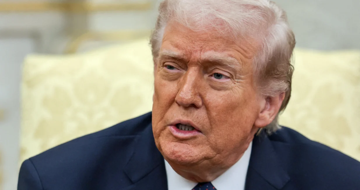 U.S. President Donald Trump speaks as he meets with German Chancellor Friedrich Merz (not pictured) in the Oval Office at the White House in Washington, D.C., U.S., March 3, 2026. REUTERS/Jonathan Ernst/Jonathan Ernst
