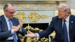 U.S. President Donald Trump and German Chancellor Friedrich Merz reach to shake hands as they meet in the Oval Office at the White House in Washington, D.C., U.S., March 3, 2026. REUTERS/Jonathan Ernst  TPX IMAGES OF THE DAY/Jonathan Ernst