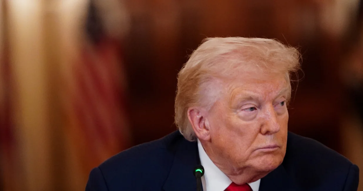U.S. President Donald Trump looks on during a round table on collegiate sports in the White House in Washington, D.C., March 6, 2026. REUTERS/Nathan Howard/Nathan Howard