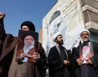 Demonstrators hold images of Iran's late Supreme Leader Ayatollah Ali Khamenei, after he was killed in Israeli and U.S. strikes on Saturday, during an anti-Israeli and U.S. rally after Friday prayer, amid the U.S.-Israeli conflict with Iran, in Tehran, Iran, March 6, 2026. Majid Asgaripour/WANA (West Asia News Agency) via REUTERS ATTENTION EDITORS - THIS PICTURE WAS PROVIDED BY A THIRD PARTY  TPX IMAGES OF THE DAY/Majid Asgaripour