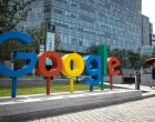 epa08979756 (FILE) - A Chinese woman walks past a 'Google' brand name and logo, near the Google office in Beijing, China, 03 August 2018 (reissued 01 January 2021). Alphabet, the parent company of internet giant Google, is due to publish their 4th quarter 2020 results on 02 January 2021. EPA/ROMAN PILIPEY *** Local Caption *** 54599547/Roman Pilipey