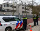 Police officers stand outside a Jewish school following an explosion that caused minor damages, in Amsterdam, Netherlands, March 14, 2026. REUTERS/Piroschka van de Wouw  TPX IMAGES OF THE DAY/Piroschka Van De Wouw