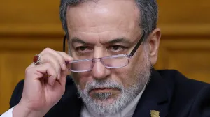 FILE PHOTO: Iranian Foreign Minister Abbas Araqchi adjusts glasses during a press conference following talks with Russian Foreign Minister Sergei Lavrov in Moscow, Russia, December 17, 2025. REUTERS/Ramil Sitdikov/Pool/File Photo/Ramil Sitdikov
