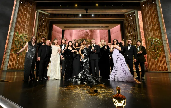 Director Paul Thomas Anderson and cast members pose after winning the Oscar for Best Picture for "One Battle after Another" at the 98th Academy Awards in Hollywood, Los Angeles, California, U.S., March 15, 2026. Richard Harbaugh/The Academy/Handout via REUTERS THIS IMAGE HAS BEEN SUPPLIED BY A THIRD PARTY. NO MARKETING OR ADVERTISING IS PERMITTED WITHOUT THE PRIOR CONSENT OF A.M.P.A.S AND MUST BE DISTRIBUTED AS SUCH./Richard Harbaugh