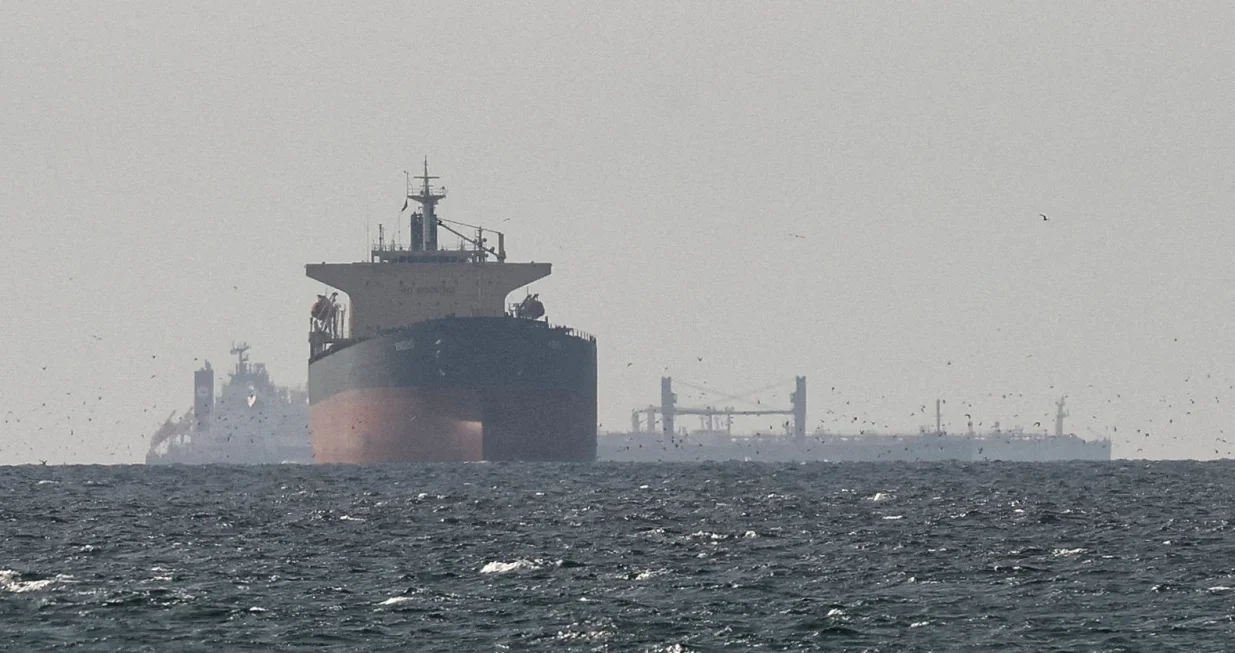 FILE PHOTO: Tankers sail in the Gulf, near the Strait of Hormuz, as seen from northern Ras al-Khaimah, near the border with Oman's Musandam governance, amid the U.S.-Israeli conflict with Iran, in United Arab Emirates, March 11, 2026. REUTERS/Stringer/File Photo/Stringer