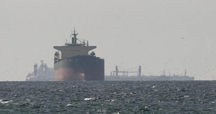 FILE PHOTO: Tankers sail in the Gulf, near the Strait of Hormuz, as seen from northern Ras al-Khaimah, near the border with Oman's Musandam governance, amid the U.S.-Israeli conflict with Iran, in United Arab Emirates, March 11, 2026. REUTERS/Stringer/File Photo/Stringer