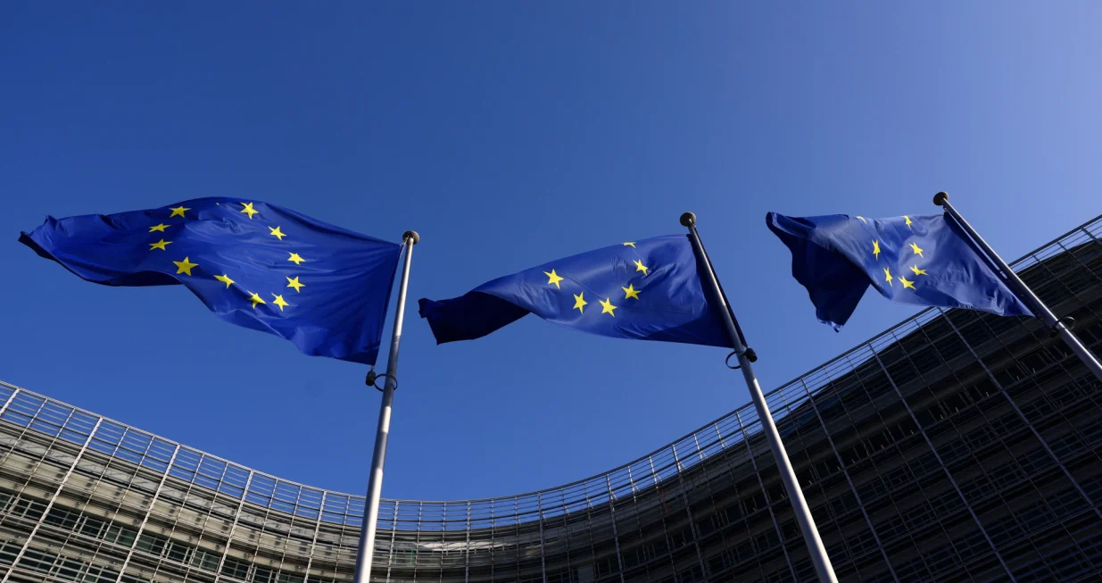 European Union flags flutter outside the European Commission headquarters in Brussels, Belgium Februrary 26, 2026. REUTERS/Yves Herman/Yves Herman