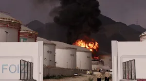FILE PHOTO: Fire and smoke rise in the Fujairah oil industry zone, caused by debris after interception of a drone by air defenses, according to the Fujairah media office, amid the U.S.-Israel conflict with Iran, in Fujairah, United Arab Emirates, March 4, 2026. REUTERS/Amr Alfiky/File Photo/Amr Alfiky