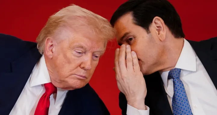 U.S. President Donald Trump listens to U.S. Secretary of State Marco Rubio during a round table on collegiate sports in the White House in Washington, D.C., March 6, 2026. REUTERS/Nathan Howard/Nathan Howard
