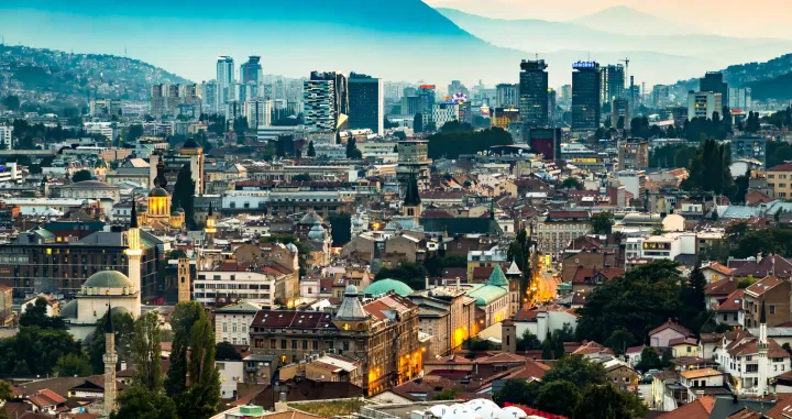 Sarajevo, Bosnia and Herzegovina - August 29 2019 Sunset view of Sarajevo historical downtown from most popular panoramic spot Yellow Fortress (Zuta Tabija), Vratnik/