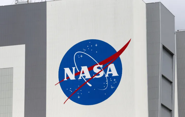 FILE PHOTO: The NASA logo is seen at Kennedy Space Center ahead of the NASA/SpaceX launch of a commercial crew mission to the International Space Station in Cape Canaveral, Florida, U.S., April 16, 2021. REUTERS/Joe Skipper/File Photo/Joe Skipper